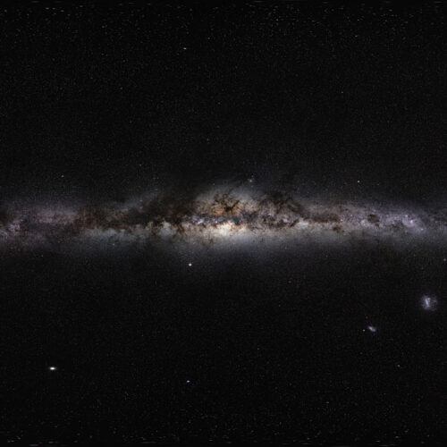 Simulations find ghostly whirls of dark matter trailing galaxy arms